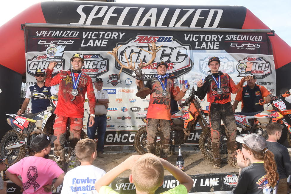 Kailub Russell (center), Thad Duvall (left) and Josh Toth (right) rounded out the previous GNCC's overall podium.
