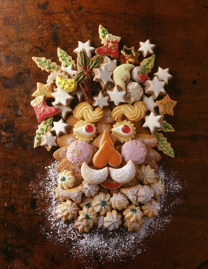 Seasons Photograph - Various Shaped Cookies In The Form Of Santa Claus Face by Kramp + G�lling Jalag