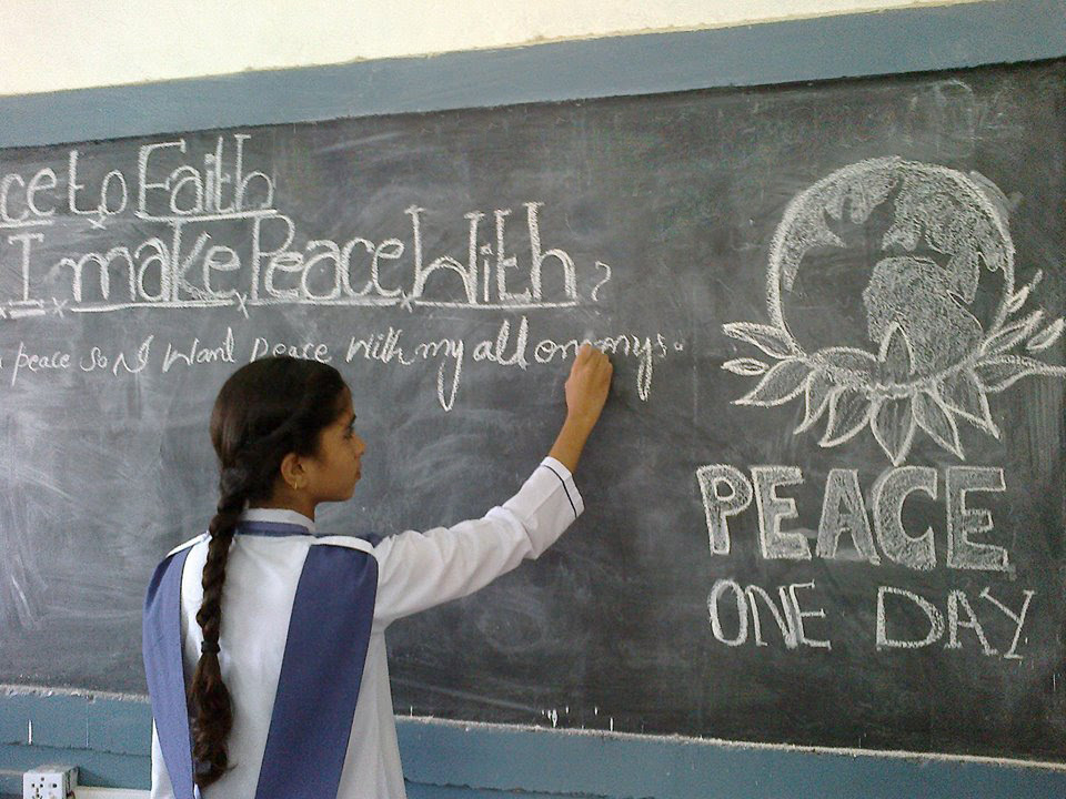 Face to Faith - Girl on chalk board