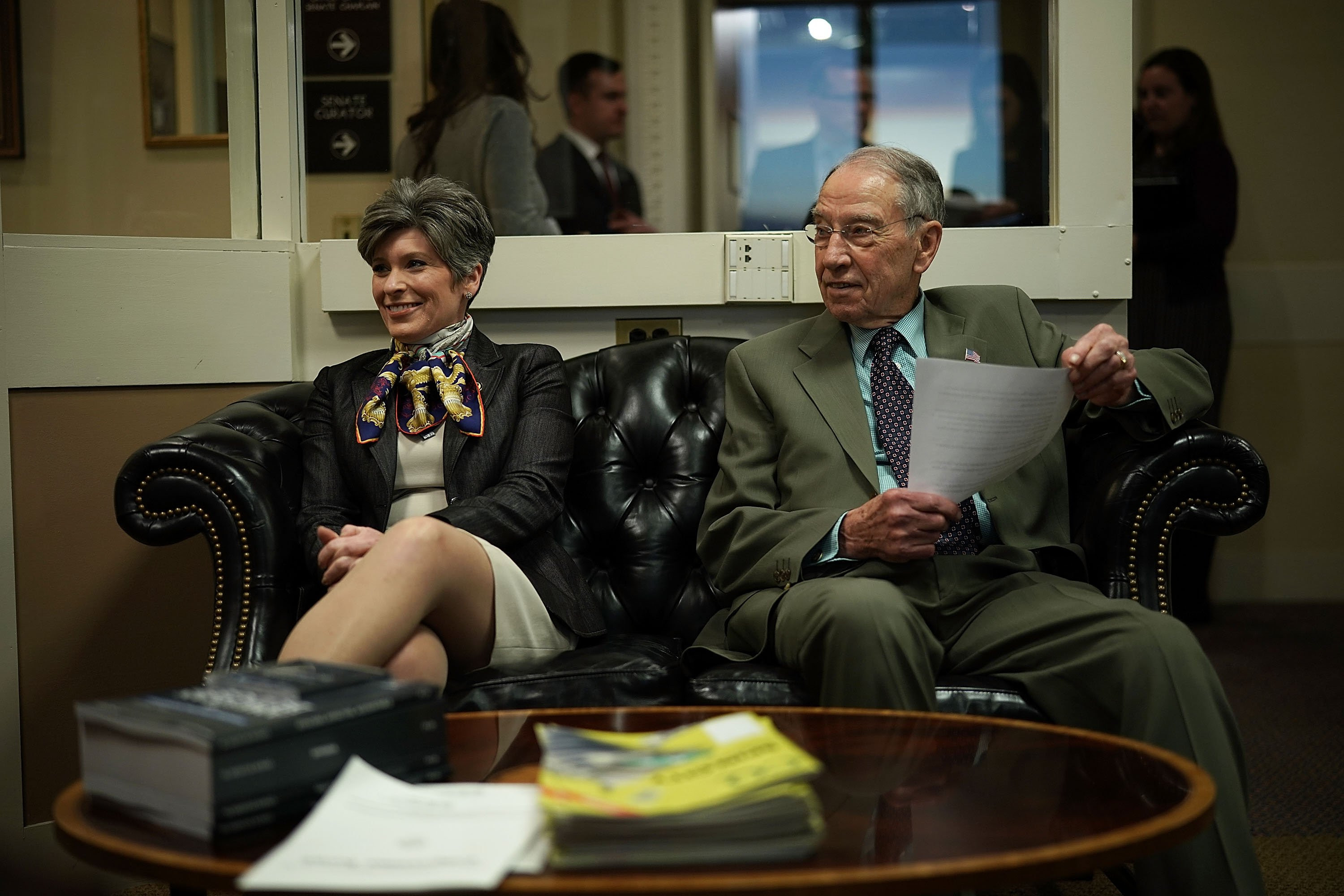 U.S. Sens. Chuck Grassley (R) and Joni Ernst wait for the beginning of a news conference on immigration February 12, 2018 at the Capitol in Washington, DC. (Photo by Alex Wong/Getty Images)