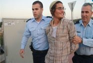 Meir Ettinger being arrested.