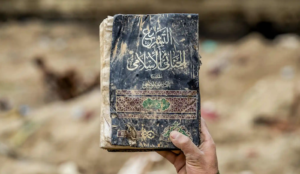 Islamic prayer book and manual of Islamic law found among ISIS remnants in formerly occupied village