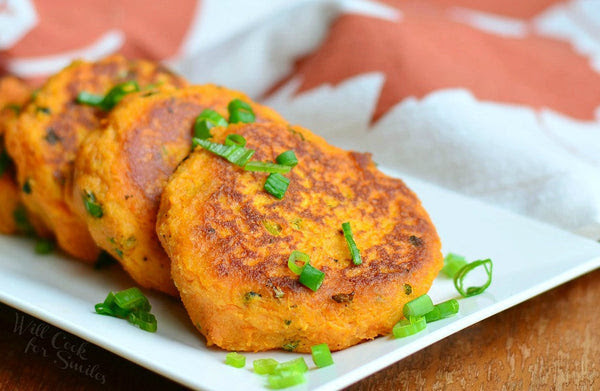 Southwest Black Bean and Sweet Potato Cakes, Coriander Lime Sour Cream, Pico Di Gallo, and Chipotle Steeped Rice,
