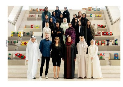 Sheikha Al Mayassa Bint Hamad bin Khalifa Al Thani and Carine Roitfield with local designers Sheikha Al Mayassa Bint Hamad bin Khalifa Al Thani and Carine Roitfield with local designers