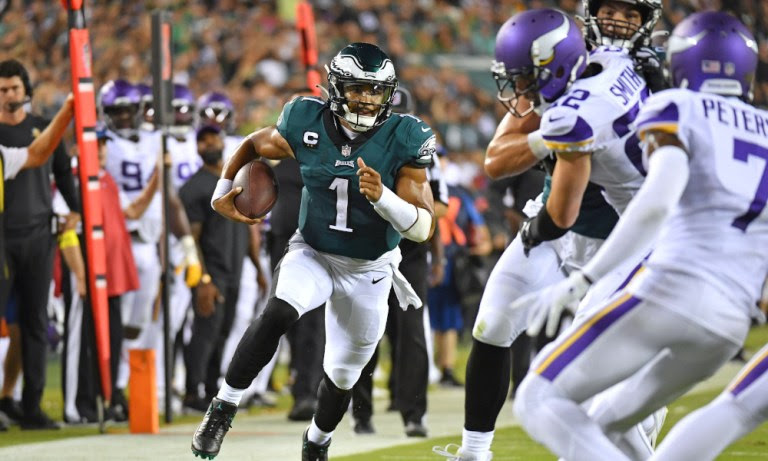 Jalen Hurts (#1) runs for a 26-yard touchdown for Eagles versus Vikings on Monday Night Football