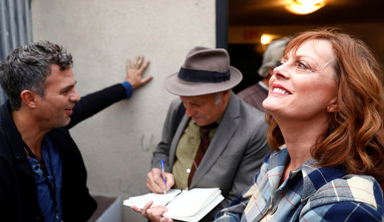 Susan Sarandon and Mark Ruffalo speak with author Greg Palast backstage at a climate change rally at MacArthur Park in Los Angeles, California, October 23, 2016.
