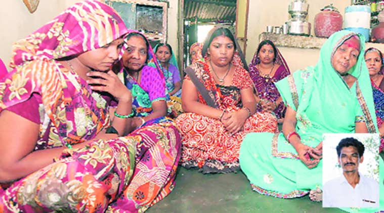 Relatives of Jayanti Gohil (inset) mourn his death, in Vadodara on Monday. (Source: Express photo by Bhupendra Rana
