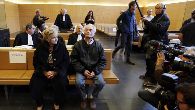 Pierre Le Guennec (R), accused of receiving stolen goods after being found in possession of paintings by late Spanish artist Pablo Picasso, sits with his wife Danielle at the court in Grasse on February 10, 2015