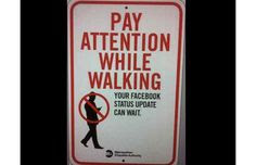 The artist Jayshells made this sign targeting the texting-while-walking folks among us. I wholeheartedly admit, I'm just as guilty as the next person. Luckily, I haven't had any incidents like walking into a pole or off a cliff... yet!