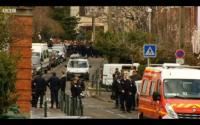 Outside the Toulouse Jewish school where Islamists murdered a rabbi and two of his children last March.