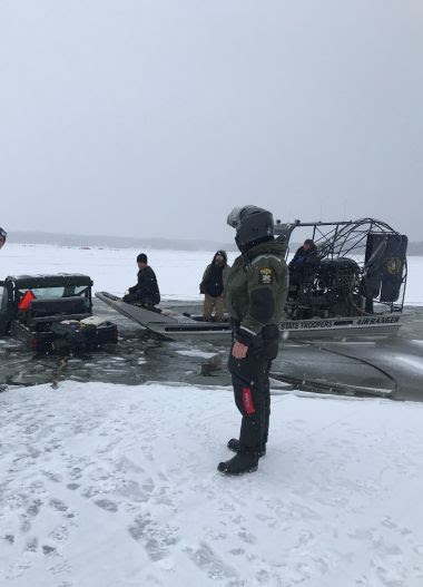 ECO patrols the ice where a UTV went through