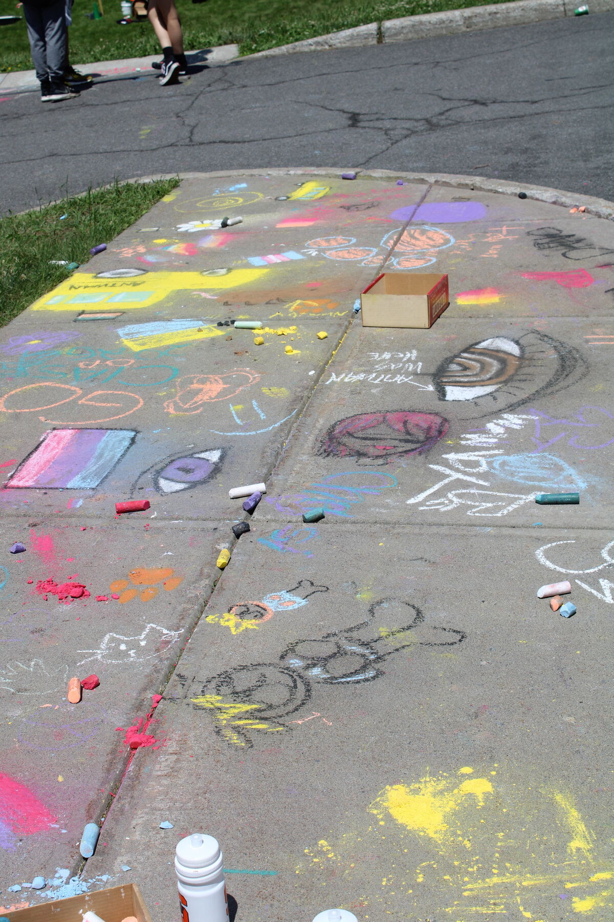 various chalk art on sidewalk