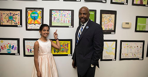 Hanover Hills student Joshitha Sriperambudur and Principal Troy Todd.