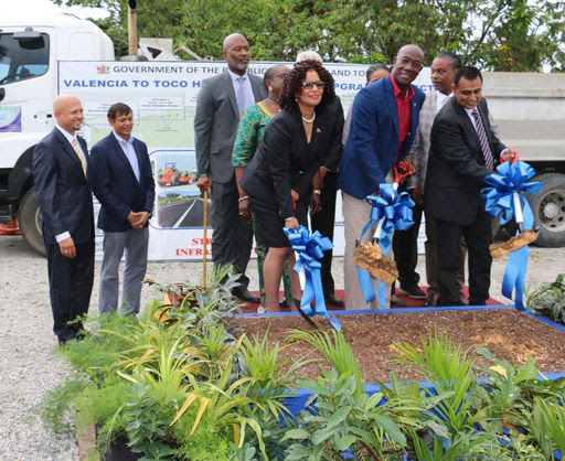 Prime Minister Dr Keith Rowley flanked by MP for Toco/Sangre Grande Glenda Jennings- Smith, left, and Minister of Works and Transport Rohan Sinanan, turn the sod for a segment of the Valencia to Toco Highway, yesterday at Valencia.