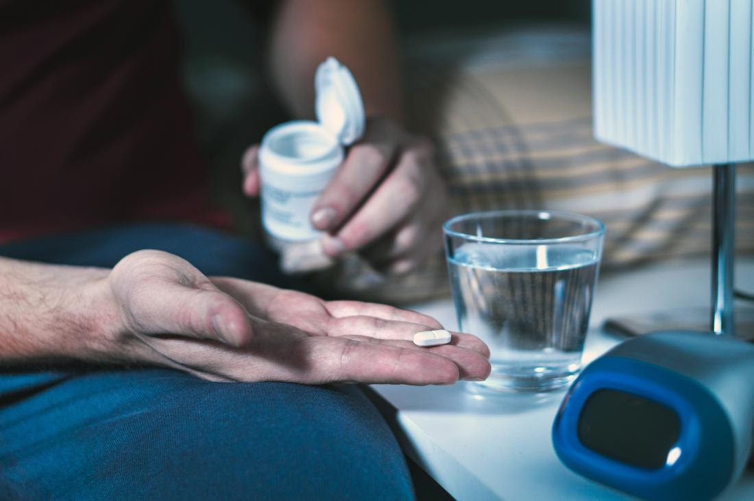 a man taking medication because that is how to get rid of toothache at night