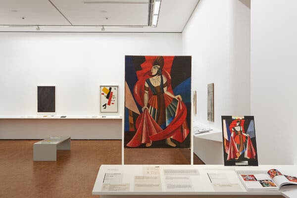 Left to right: “Black on Black by Alexander Rodchenko, “Supremus No. 38” by Kazimir Malevich and a costume design, “Herod,” attributed to Aleksandra Ekster.