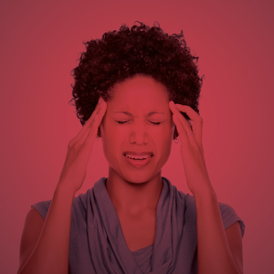 pain woman holding head