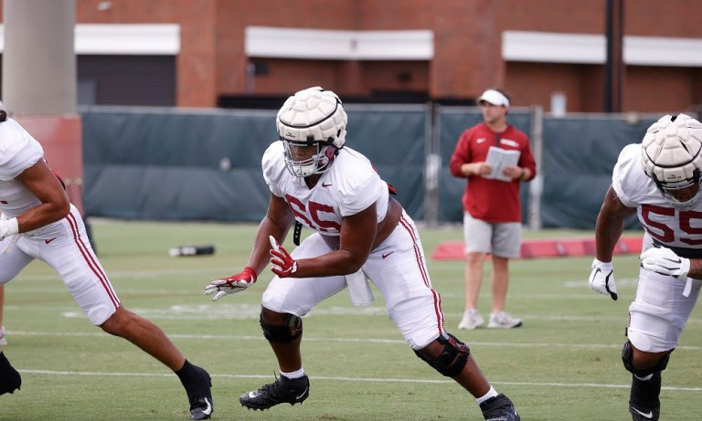 JC Latham (#65) going through drills at Alabama practice