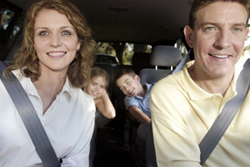 image of a happy family taking a drive