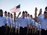 Airmen repeat the oath of enlistment at the Air Force Basic Training graduation ceremony, Lackland Air Force Base, Texas (U.S. Air Force, Staff Sgt Vernon Young Jr.)