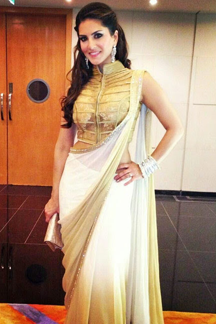 Sunny Leone poses in white and golden saree