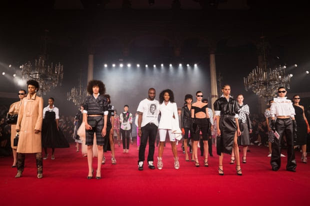 Designer Virgil Abloh takes his bow with supermodel Naomi Campbell after the Off/White show at Paris Fashion Week on September 28, 2017.
