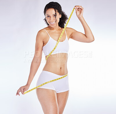 Weight loss, measure tape and wellness of a black woman beauty model with  stomach measurement. Portrait of a woman checking health, diet and healthy  fitness progress feeling happy with a smile |