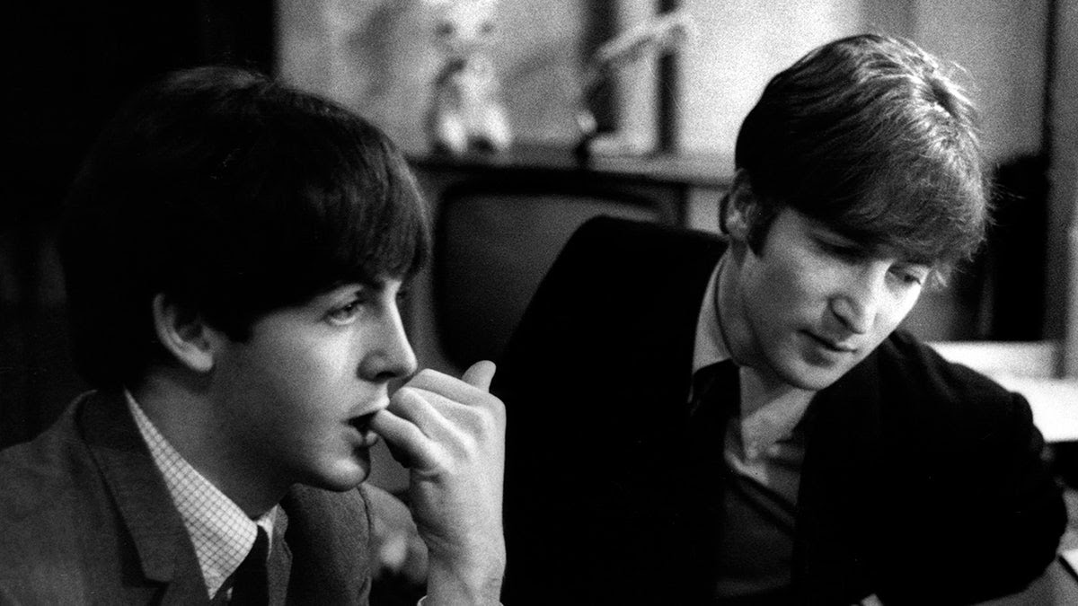 John Lennon with Paul McCartney