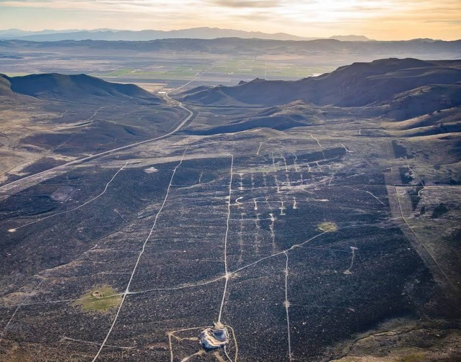 A view looking toward Kings River Valley, Nevada over grids of exploratory wells in the area Lithium Americas plans to mine. Credit: Chris Boyer/Kestrel Aerial Services