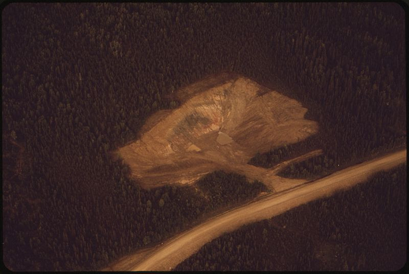 File:A STATE OF ALASKA HIGHWAY DEPARTMENT GRAVEL PIT LOCATED A MILE EAST OF THE PIPELINE ROUTE. CONTRACTORS BUILDING THE... - NARA - 550568.jpg