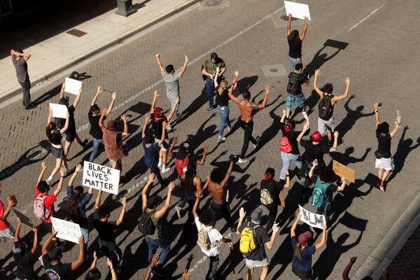 Protesters chanting
"Hands up, don't shoot" in San Antonio last
June, soon after the killing of George Floyd.