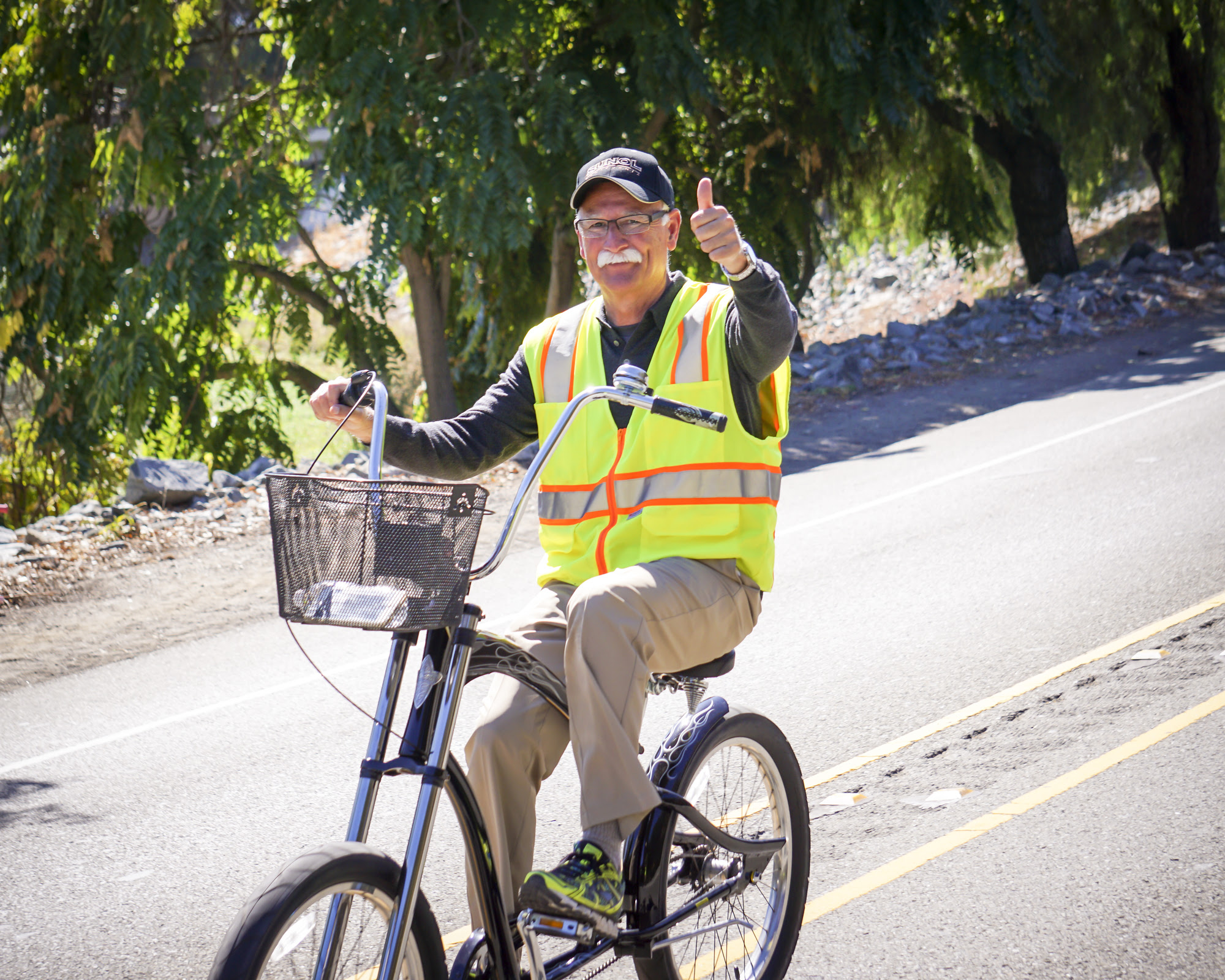 Supervisor Richard Valle on bicycle at 2015 Stroll & Roll
