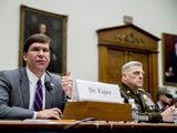 Defense Secretary Mark Esper, left, accompanied by Joint Chiefs of Staff Chairman Gen. Mark Milley, right, speaks at a House Armed Services Committee hearing on Capitol Hill, Wednesday, Feb. 26, 2020, in Washington. (AP Photo/Andrew Harnik)