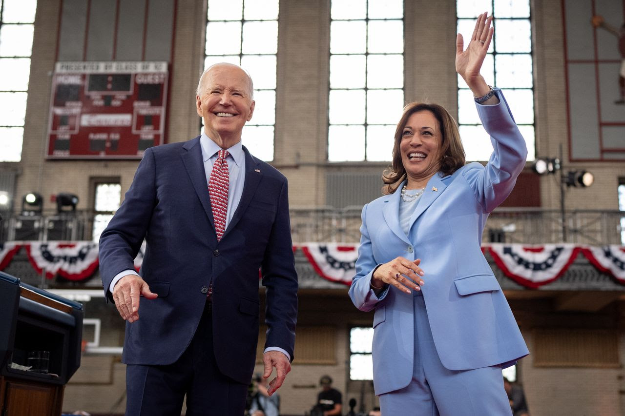 President Biden and Vice President Harris wave appear at a campaign rally in Philadelphia in late May. (Andrew Harnik/Getty Images)