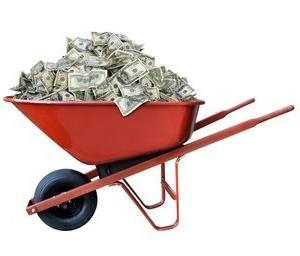 Wheelbarrow filled with cash