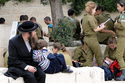 A father sits
                      with his daughter in Jerusalem. Around the two are
                      the young men and women who are called upon to
                      protect Israel from the nation's enemies.