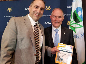 Blogger Marc Morano presents his book, “The Politically Incorrect Guide to Climate Change,” to EPA Administrator Scott Pruitt yesterday. Photo credit: Marc Morano/Twitter