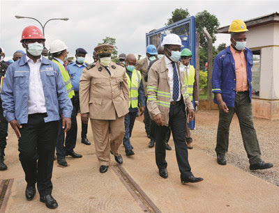 Gaston Eloundou Essomba, Cameroon's Minister of Water and Energy (second on the right), accompanied by Ngangoua Serge (first on the left), at the site of the construction of the new transmission line of the Memve'ele hydroelectric power plant on July 10, 2020.