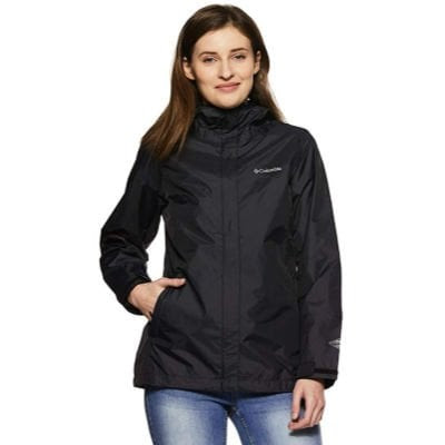 female college student smiling and wearing a Columbia waterproof jacket