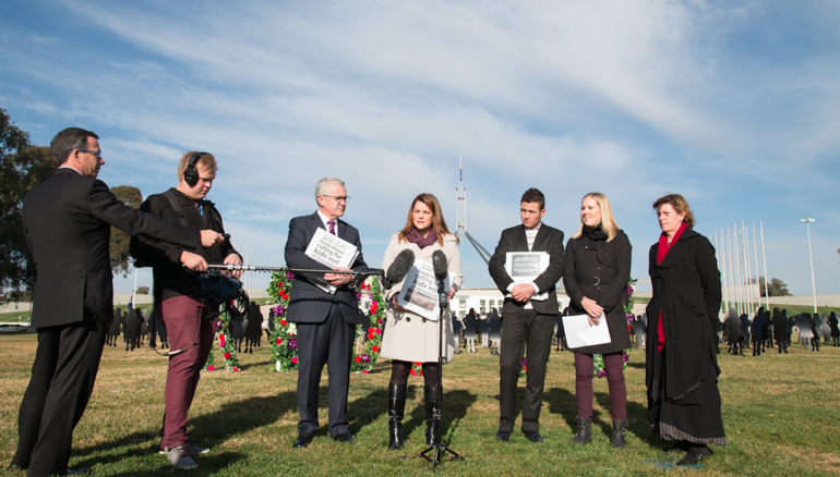 Politicians speaking at petition delivery