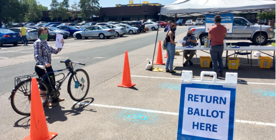 People dropping off ballots at the Early Vote Center in 2020 primary election