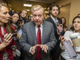 Sen. Lindsey Graham, R-S.C., speaks to reporters as he arrives at the Capitol in Washington, Monday, Jan. 27, 2020, during the impeachment trial of President Donald Trump on charges of abuse of power and obstruction of Congress. (AP Photo/Manuel Balce Ceneta)