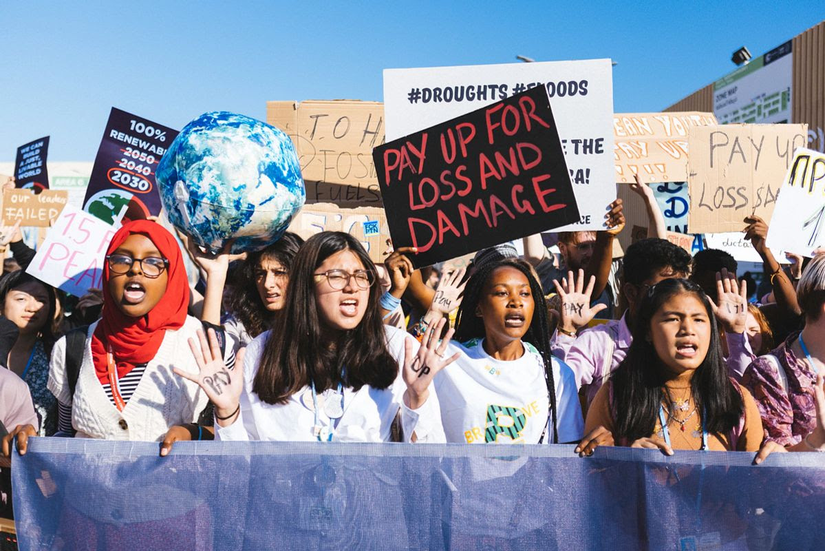 Youth climate activists march at COP27 in Sharm El-Sheikh.