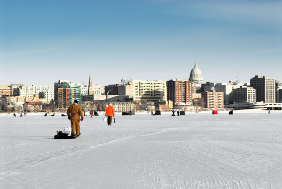 An image of a angler walking around on frozen lake in Madison, Wisconsin. 