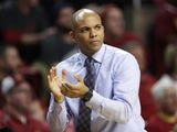 FILE - In this Monday, Nov. 14, 2016 file photo, Then-Mount St. Mary&#39;s head coach Jamion Christian applauds his team during the first half of an NCAA college basketball game against Iowa State in Ames, Iowa. For all the stops and starts endured by men&#39;s and women&#39;s college basketball teams because of the pandemic, more than 80% of scheduled conference games were played this season, according to research by The Associated Press. The season was nonetheless a grind for most teams and none had it harder than the George Washington men and UC Davis women. (AP Photo/Charlie Neibergall, File)