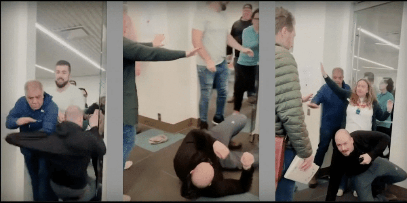 (WATCH) Pastor shoved out door, knocked on his back after protesting library’s drag queen event for children, Gets charged for “Hate Crime”