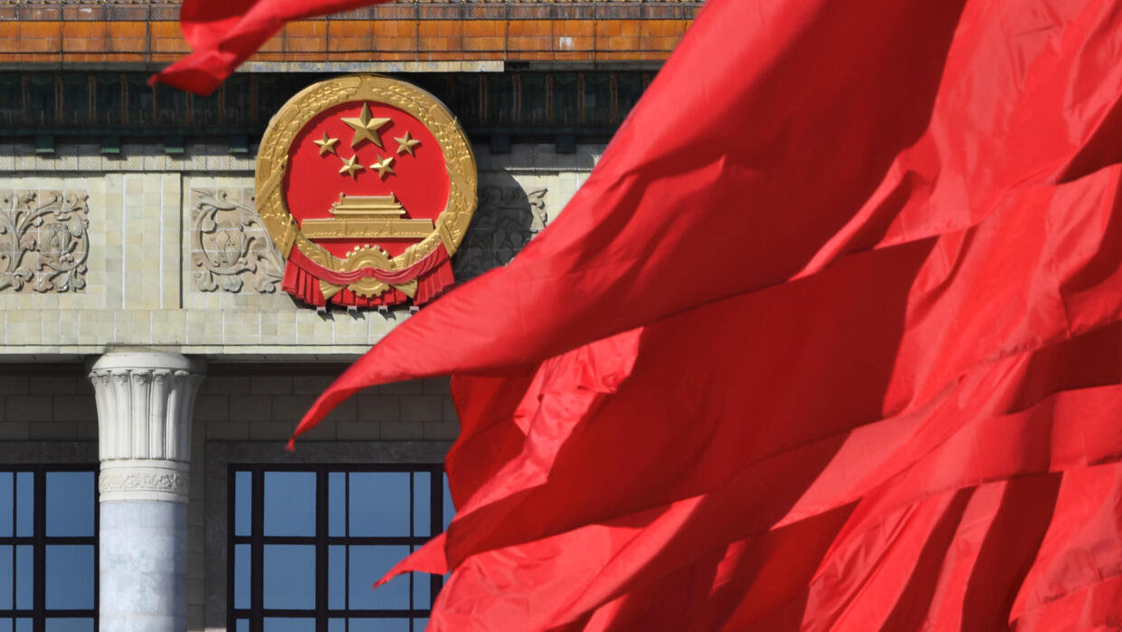 Cờ Trung Quốc trước Đại Sảnh Đường Nhân Dân Trung Quốc nhân lễ bế mạc khóa họp Chính Hiệp Trung Quốc tại Bắc Kinh (Trung Quốc) ngày 13/03/2019. Ảnh minh họa.3, 2019.