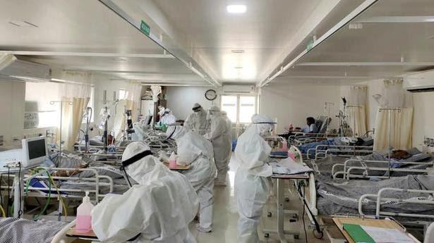  COVID-19 patients being treated inside the first unit of a makeshift ICU set up at Aster MIMS hospital in Kozhikode on Saturday. 