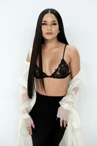 Image may contain Person Adult Hair Black Hair Portrait Head Face Photography Dress Clothing and Lingerie