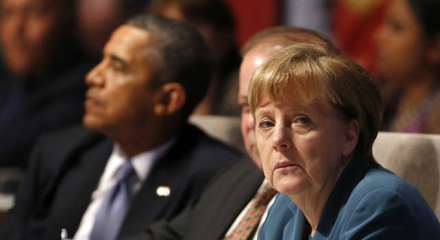 El presidente estadounidense Barack Obama y la canciller alemana Angela Merkel en la sesión inaugural de la Cumbre de Seguridad Nuclear celebrada en La Haya (Holanda).